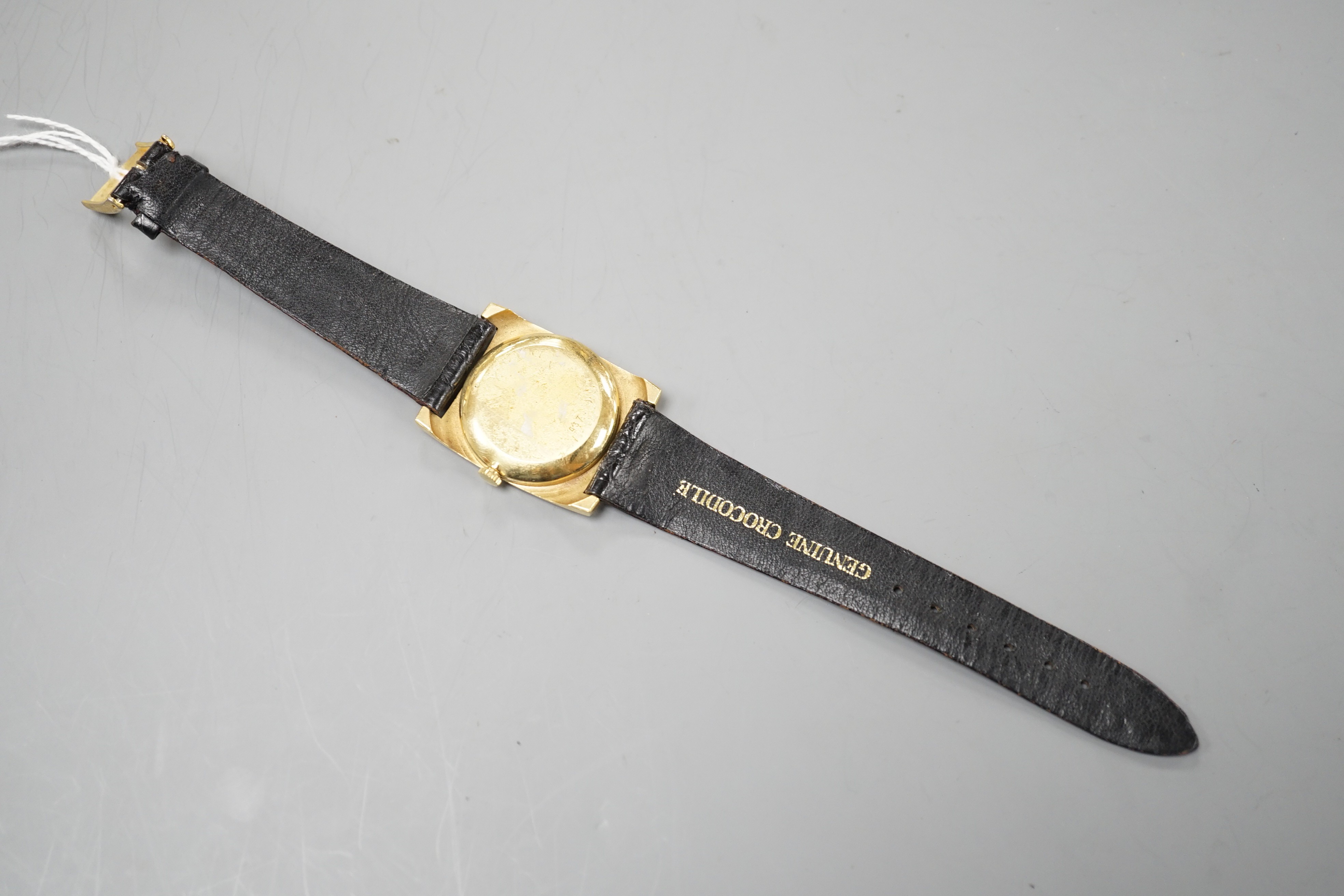 A gentleman's modern 18k Jean Renet manual wind wrist watch, on associated leather strap, case diameter 30mm, gross weight 31.6 grams.